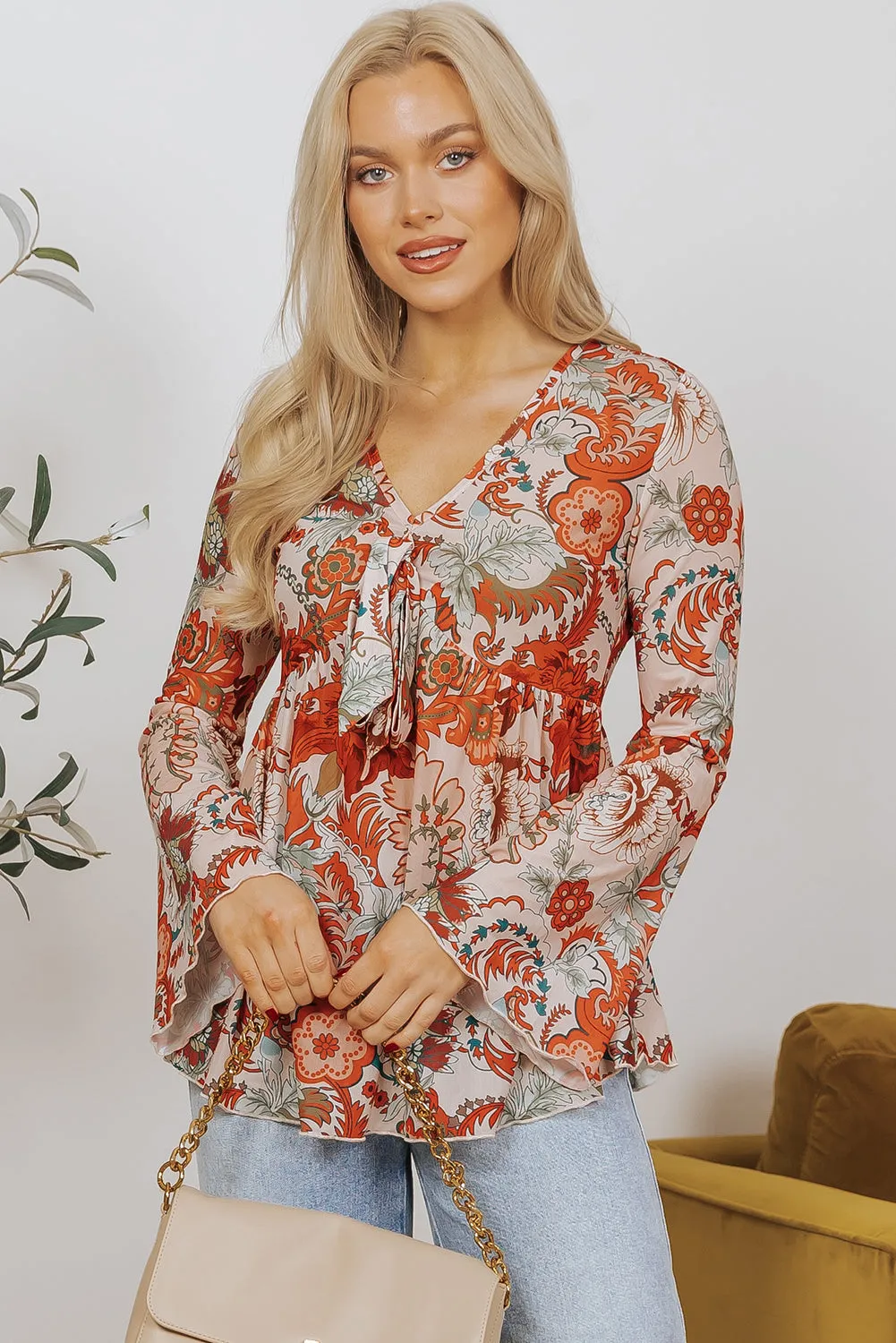 Celeste Floral V Neck Knot Bell Sleeve Blouse