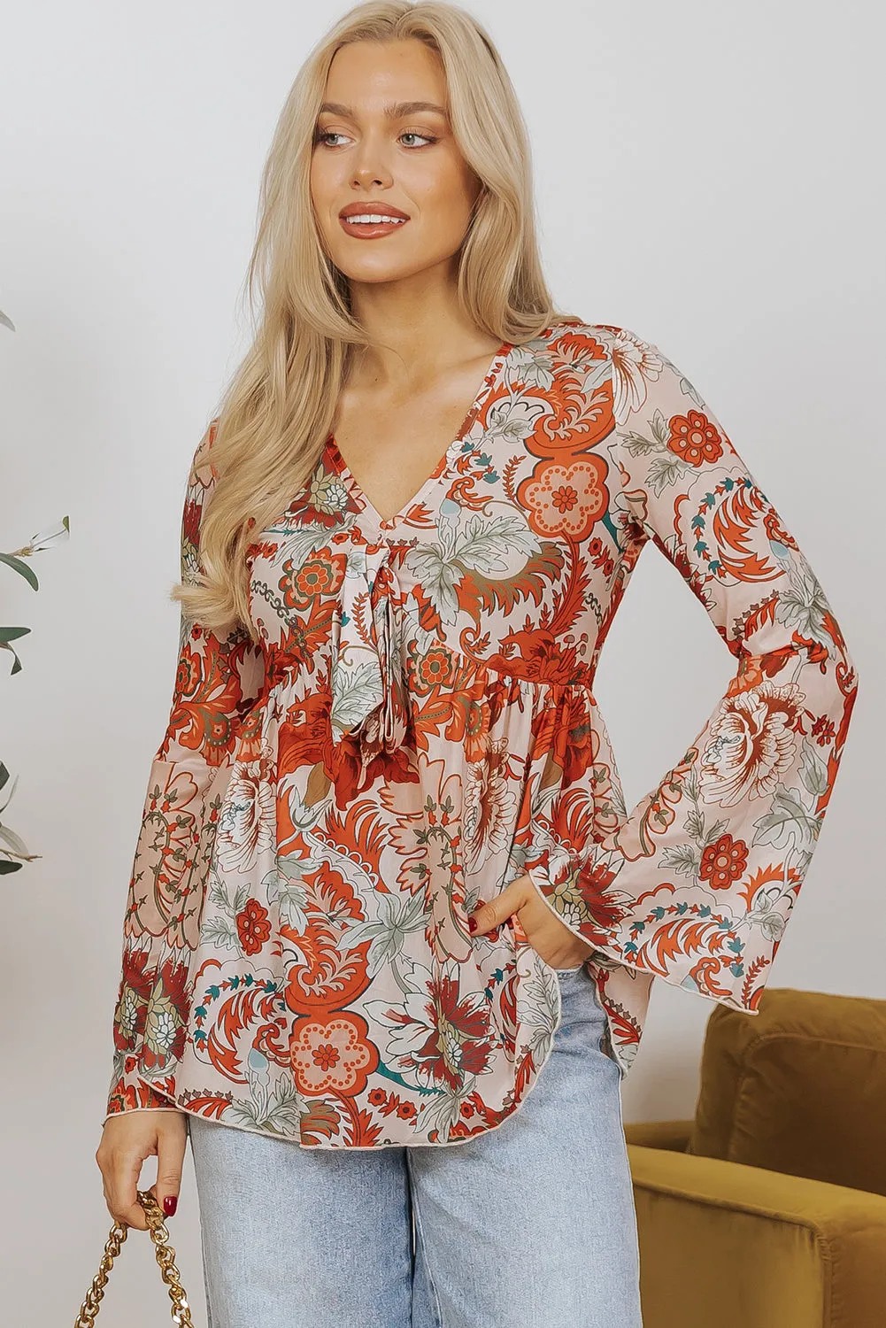 Celeste Floral V Neck Knot Bell Sleeve Blouse